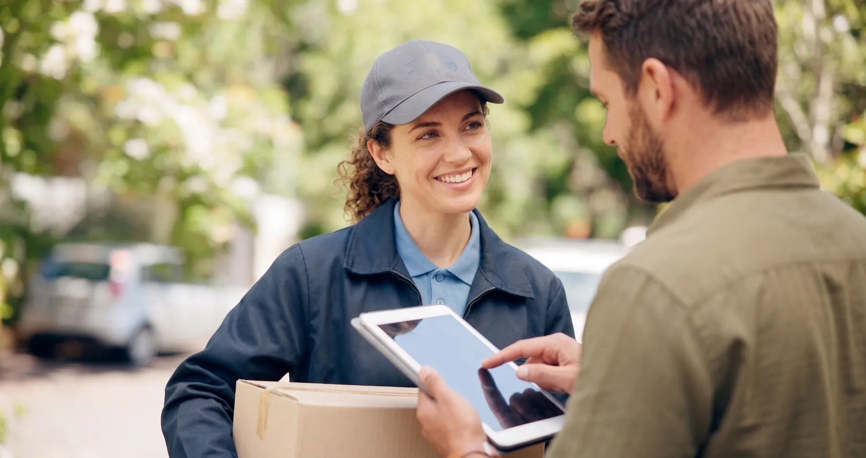 A rep talking with a customer at the door